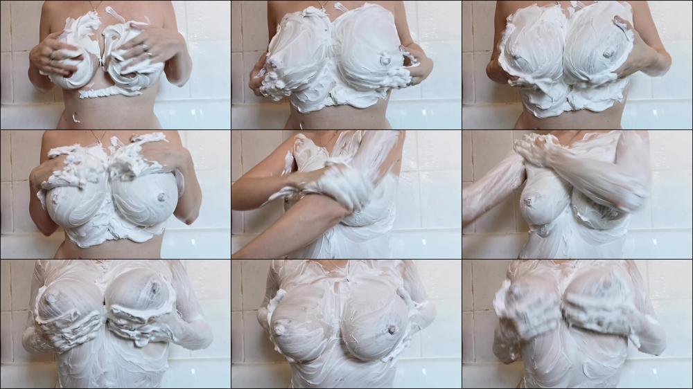 Rubbing shaving cream into tits