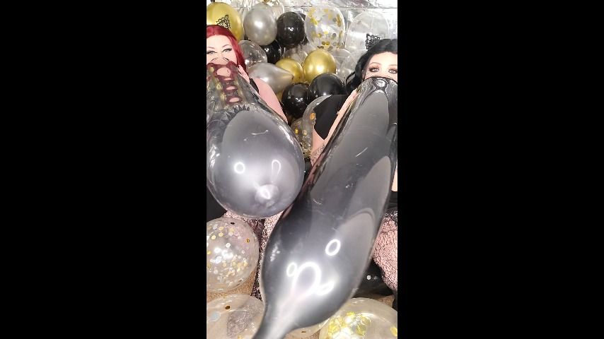 Goth GFs blow long black balloons - January 16, 2022